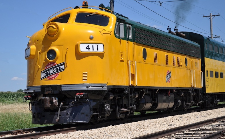  Roster photo of CNW F-unit #411in standard CN yellow and green attire.